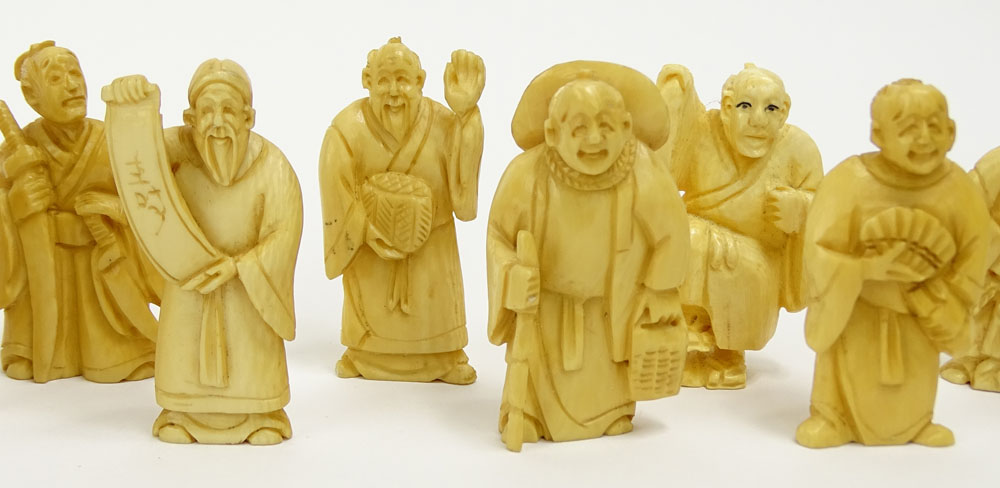Collection of Twelve (12) Mid 20th Century Japanese Carved Ivory Netsukes.