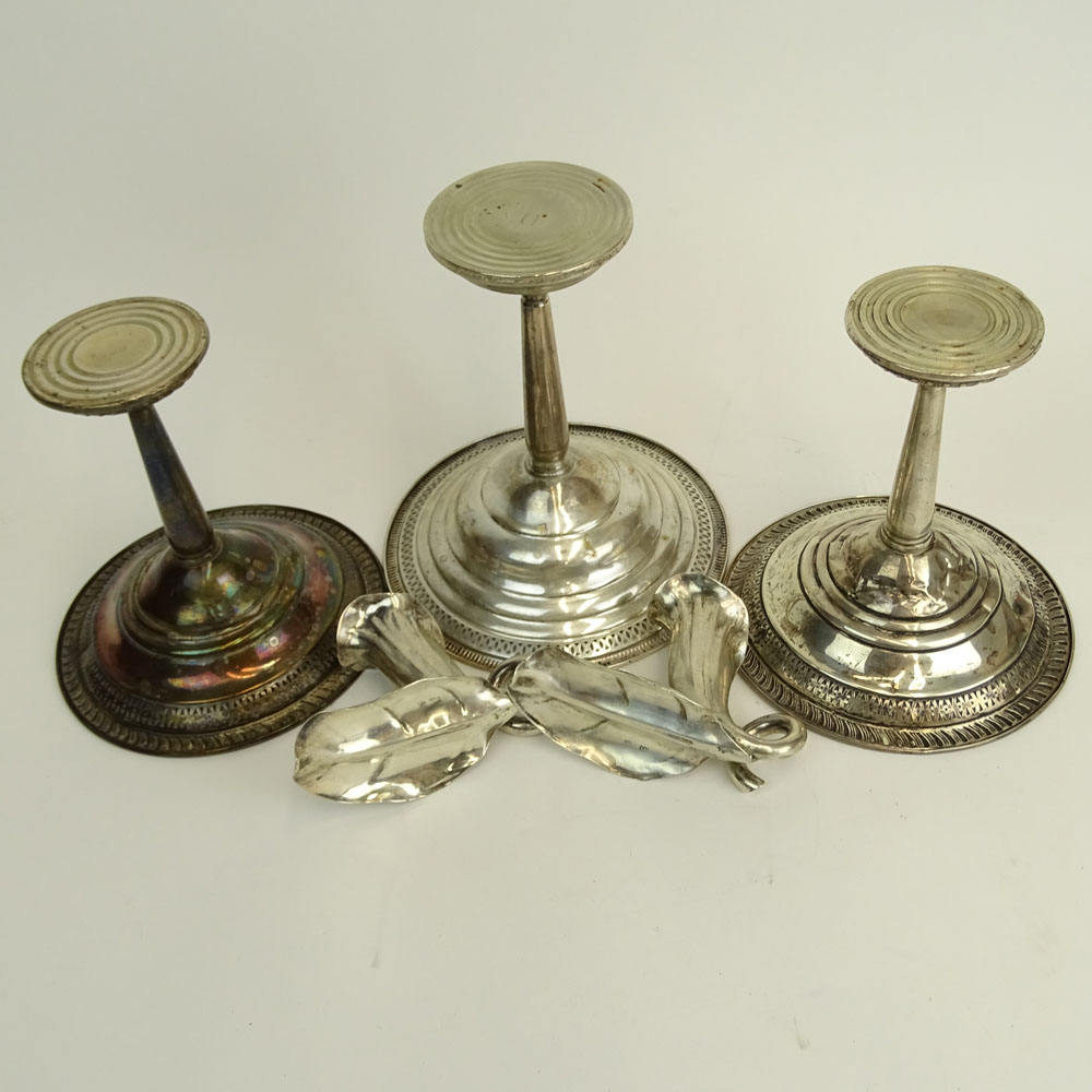 Three Weighted Sterling Silver Compotes and a Pair of 900 Silver Flower Candlesticks.
