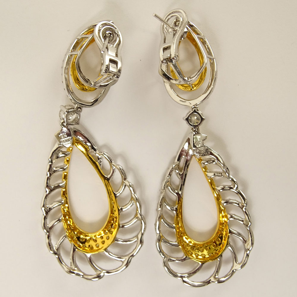 Lady's Round Brilliant Cut Yellow and White Diamond and 18 Karat Gold Chandelier Earrings.