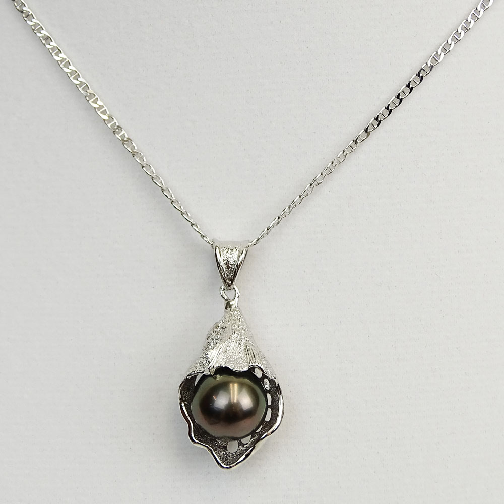 Lady's Black Pearl and Sterling Silver Pendant Necklace. Pearl measures 12.5mm.