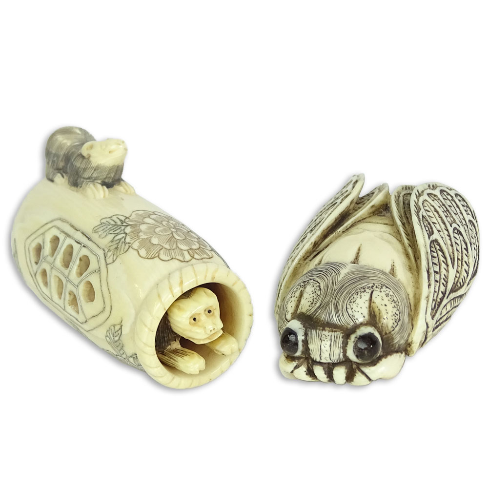 Two Carved Netsuke. One in the form of a cricket.cicaida, the other a moveable monkey coming out of a basket. 