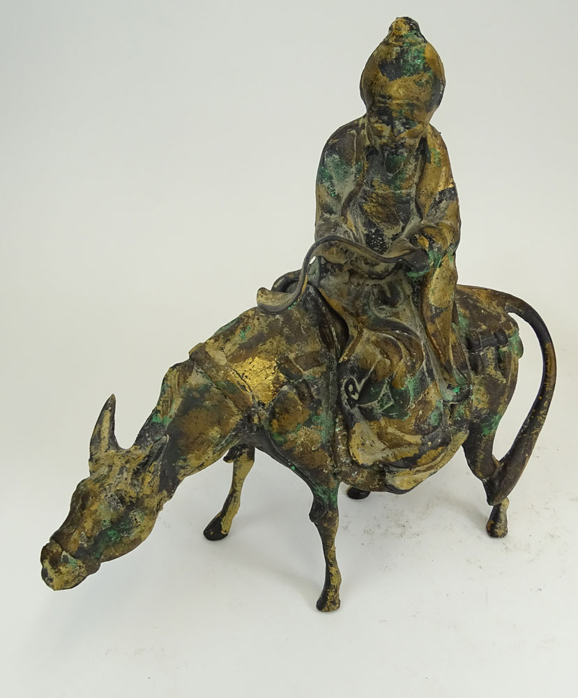 A Chinese Iron Sculpture Depicting a Scholar on a Donkey and a Miniature Ming Tree.