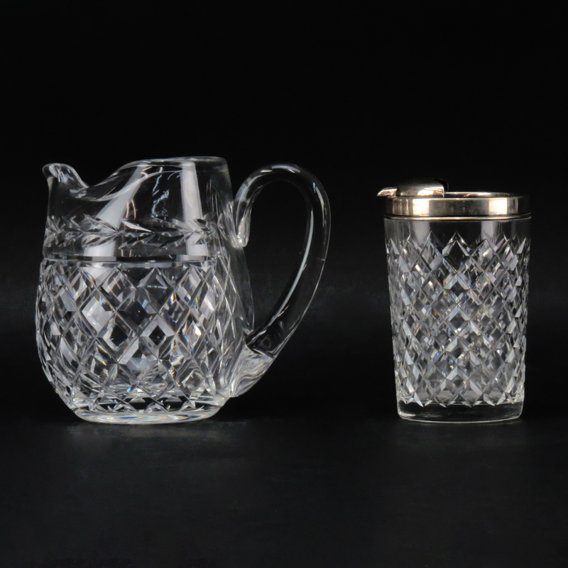 Two Cut Crystal Pitchers. A Waterford "Glandore" Ice Lip Pitcher and a Hawkes Crystal and Sterling Pourer.