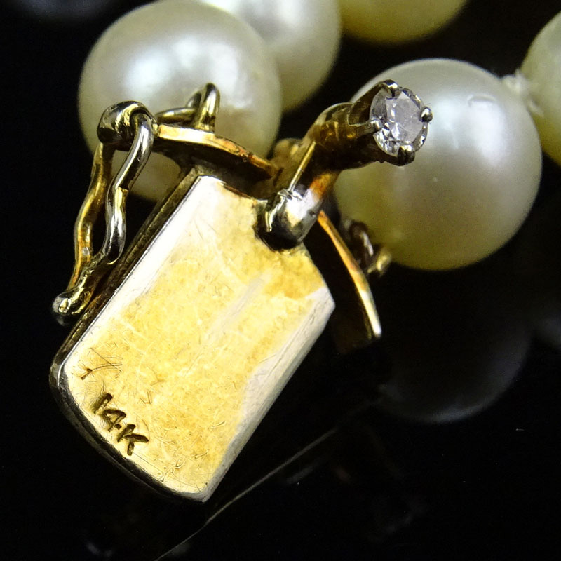 Vintage Double Strand White Pearl Necklace with 14 Karat Yellow Gold and Diamond Clasp