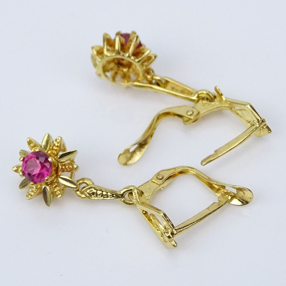 Pair of Vintage European 18 Karat Yellow Gold and Round Cut Ruby Earrings