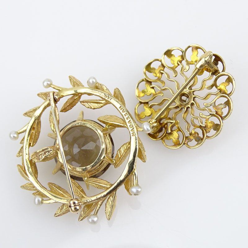 Vintage 14 Karat Yellow Gold and Small Round Cut Diamond Brooch together with a 14 Karat yellow Gold, Topaz and Seed Pearl Pendant/Brooch