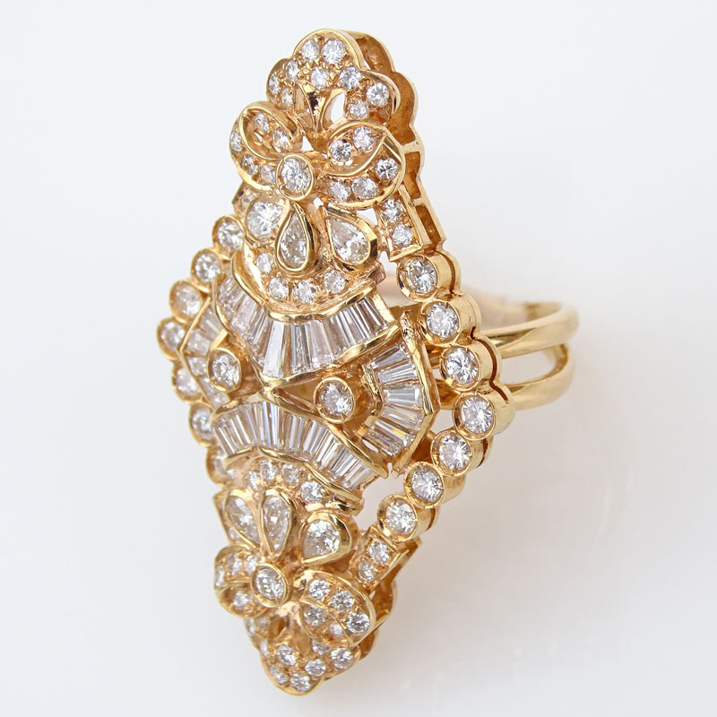  4.0 Carat Round Brilliant, Tapered Baguette and Pear Shape Diamond and 18 Karat Rose Gold Ring.