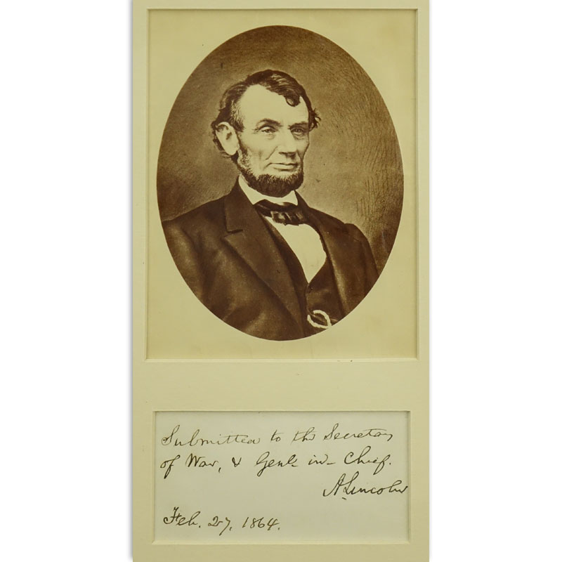 Antique Photograph of Abraham Lincoln with a separate hand written inscription "Submitted to the Secretary of War, & Genl in Chief