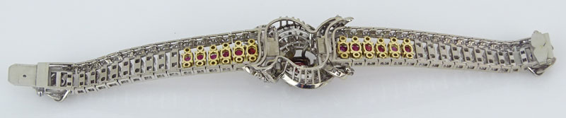Retro Circa 1940s Ruby, Round Brilliant and Baguette Cut Diamond, Platinum and 18 Karat Yellow Gold Bracelet