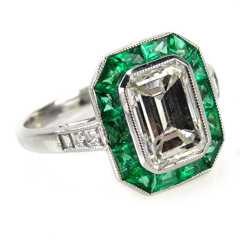 Platinum Diamond, Emerald and Platinum Ring Set in the Center with an Approx