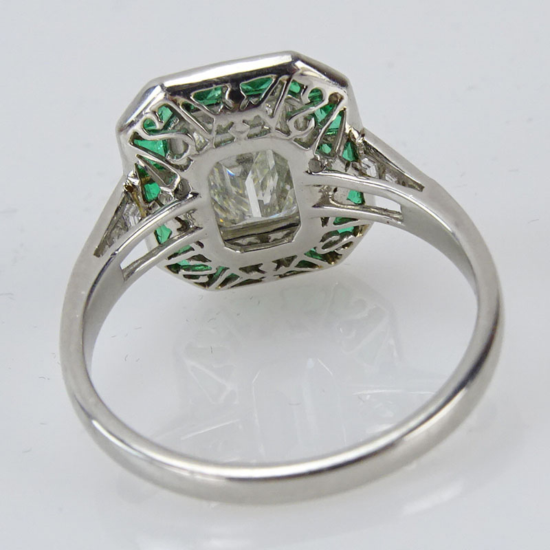 Platinum Diamond, Emerald and Platinum Ring Set in the Center with an Approx