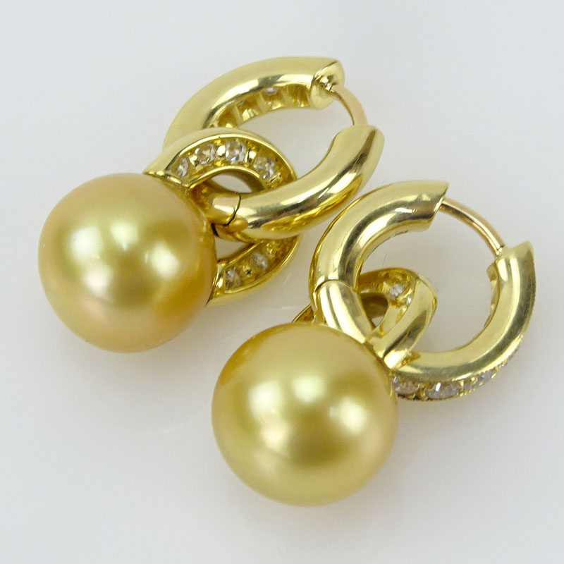 18 Karat Yellow Gold, Approx. 1.60 Carat Round Brilliant Cut Diamond and Golden South Sea Pearl Earrings. 