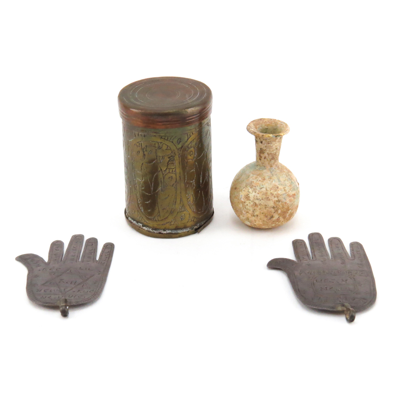 Early Judaica Lot. Includes a Roman Glass miniature bottle, a brass and copper round box, 2 Silver Hamsa pendants. 