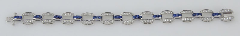  3.99 Carat Calibre Cut Sapphire, 1.98 Carat Round Cut Diamond and Platinum Bracelet