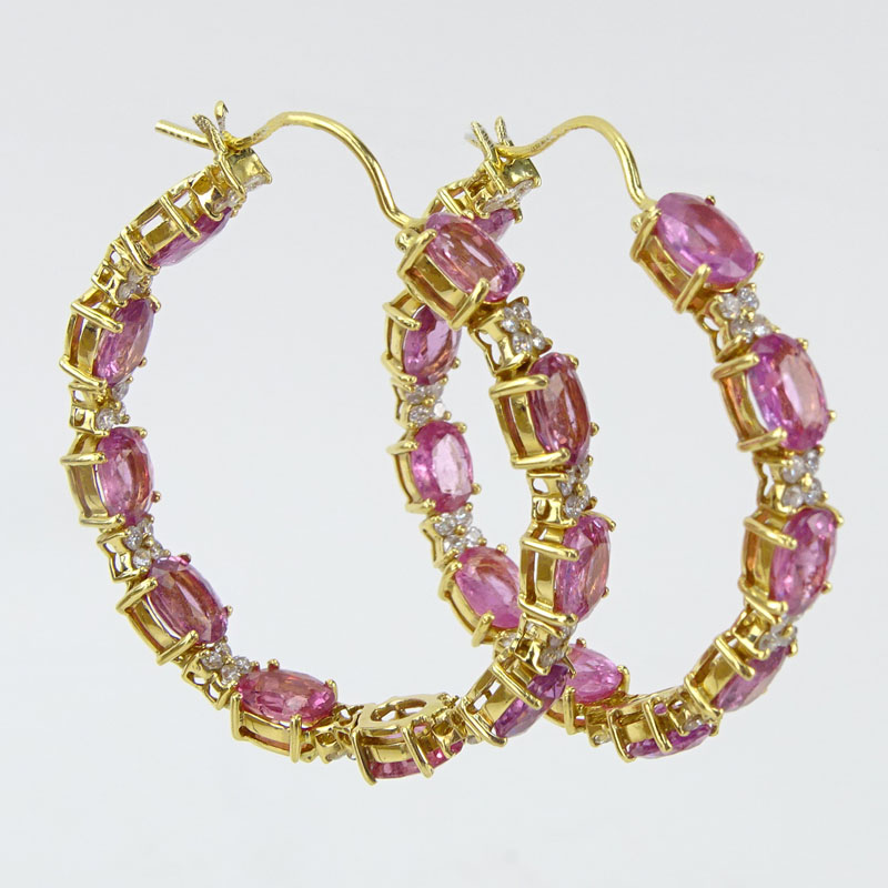 19.97 Carat Oval Cut Pink Sapphire. 1.70 Carat Round Brilliant Cut Diamond and 18 Karat Yellow Gold Hoop Earrings.