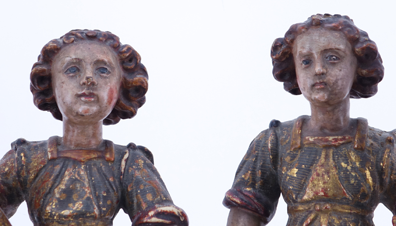 Pair of Late 18th or Early 19th Century Italian Wood Carved Polychrome and Gilt Santos Figures.