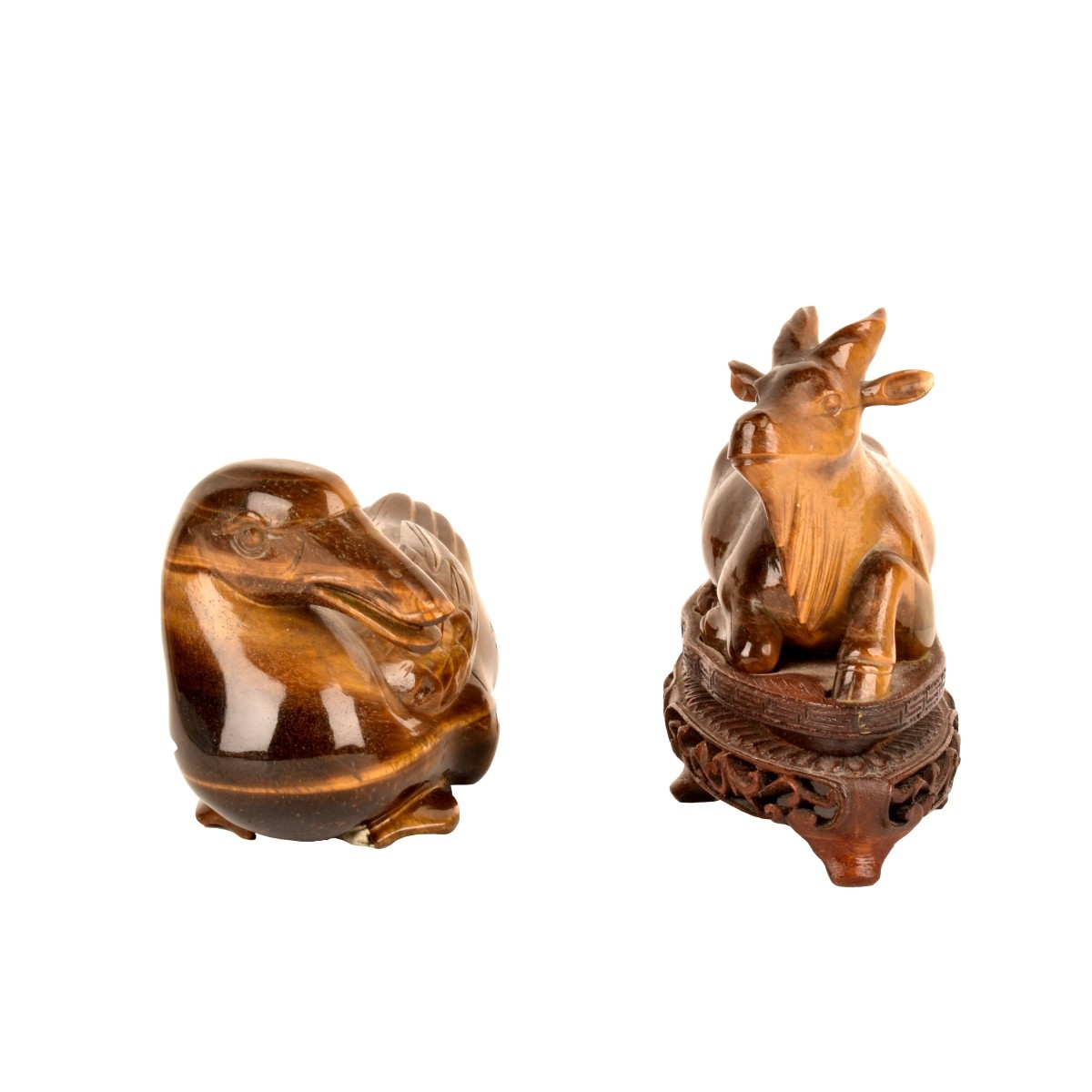 Two Chinese Tiger Eye Figurines