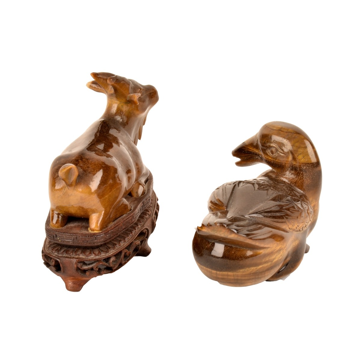 Two Chinese Tiger Eye Figurines