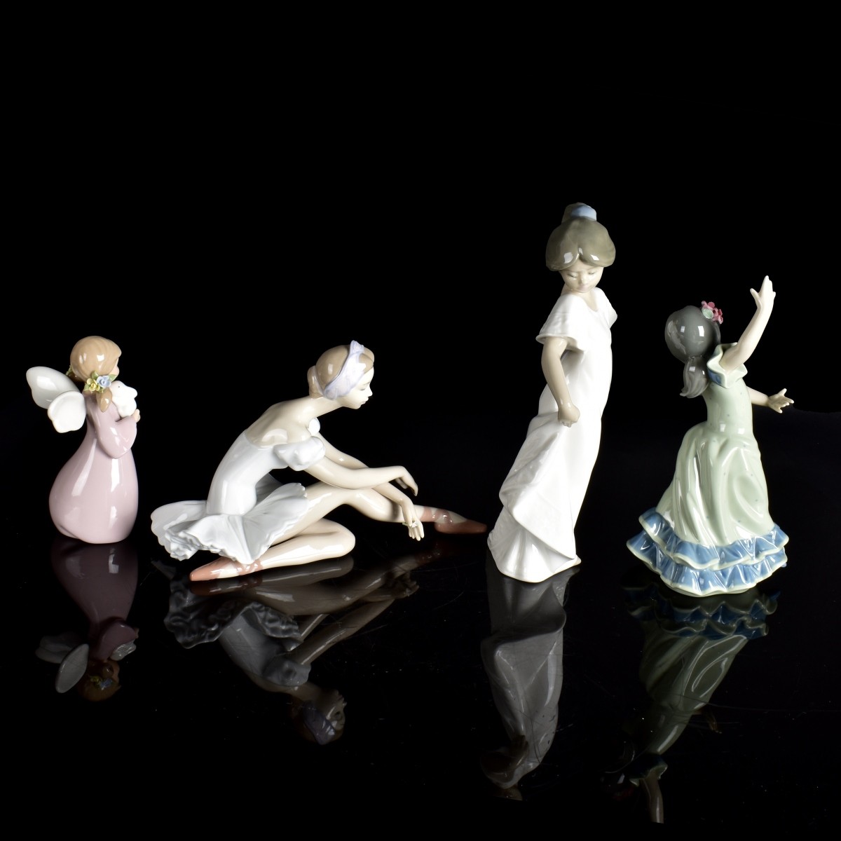 Four Lladro Porcelain Figurines