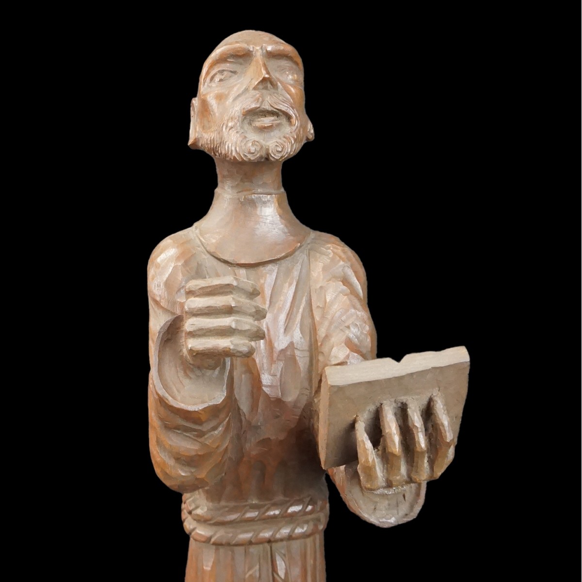 Hand Carved Santos Figurine Reading