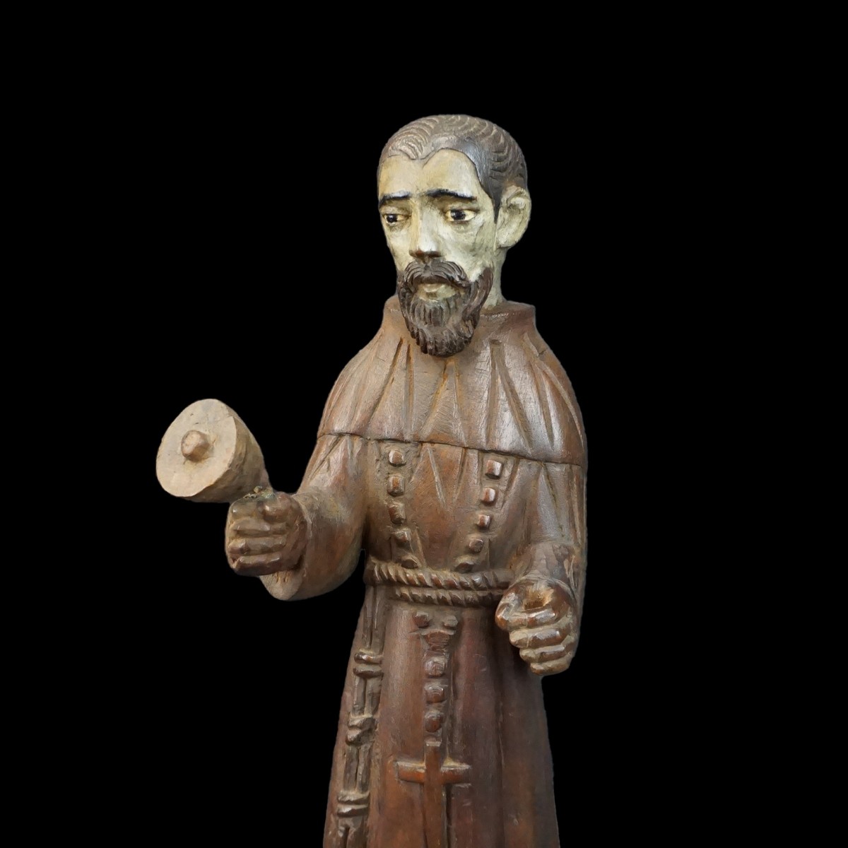 Hand Carved Santos Figurine ringing Bell