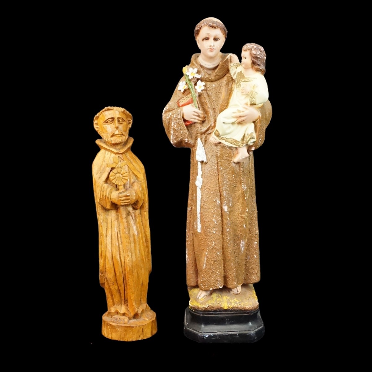 Four Santos Figurines