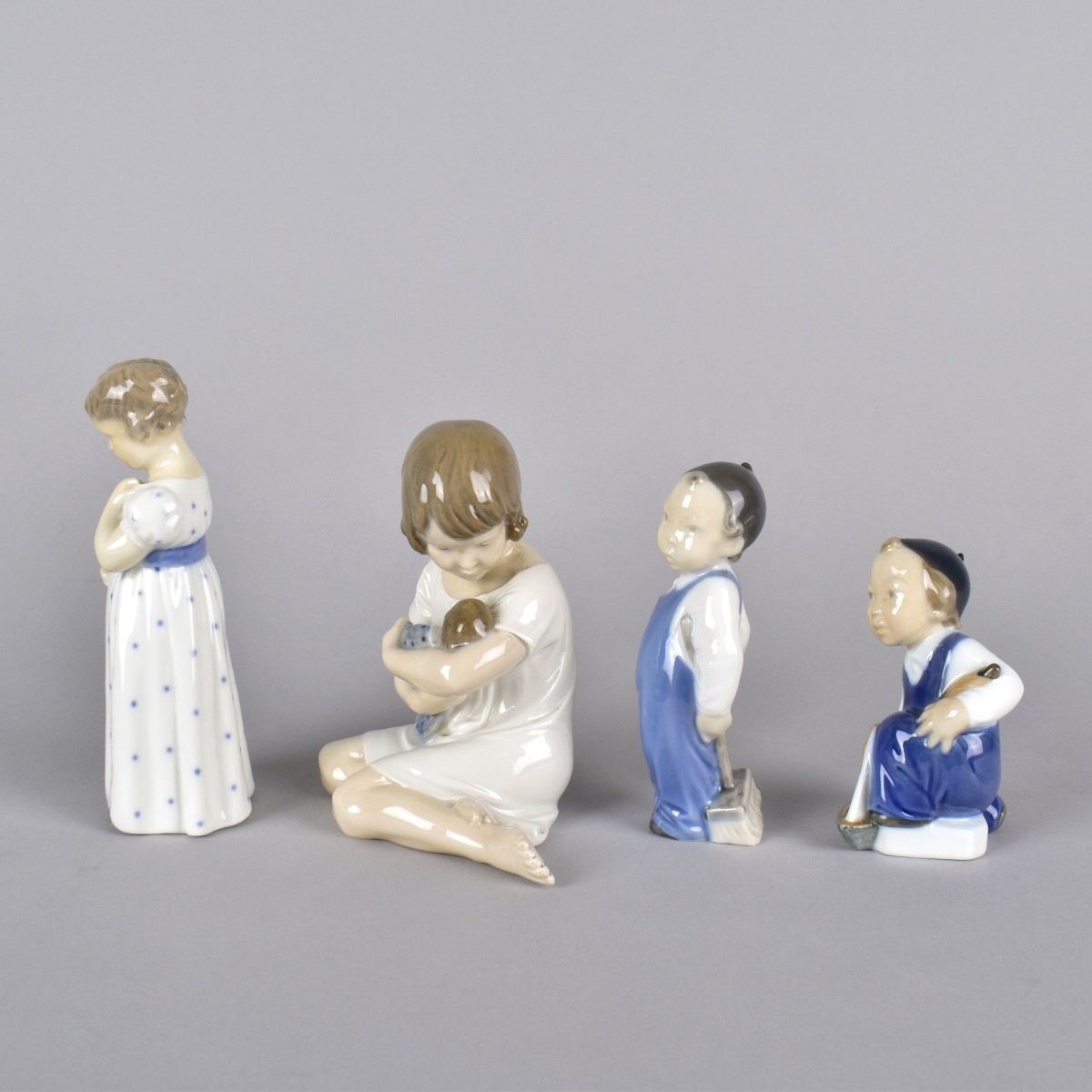 Four Vintage Royal Copenhagen Porcelain Figurines