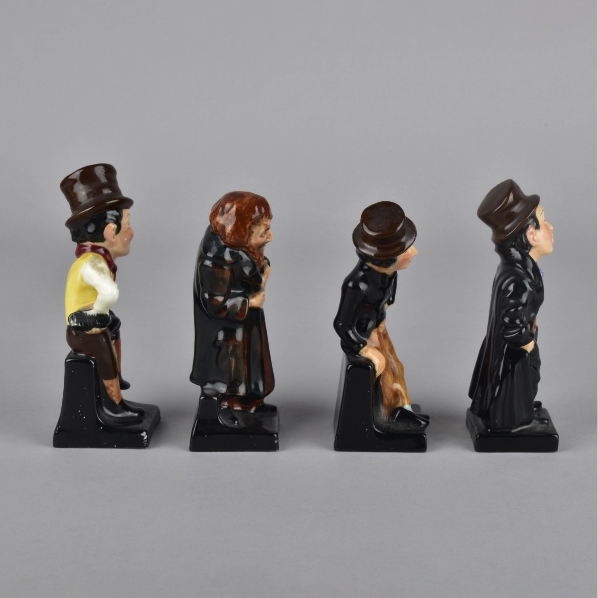 Four (4) Royal Doulton Dickens Figurines