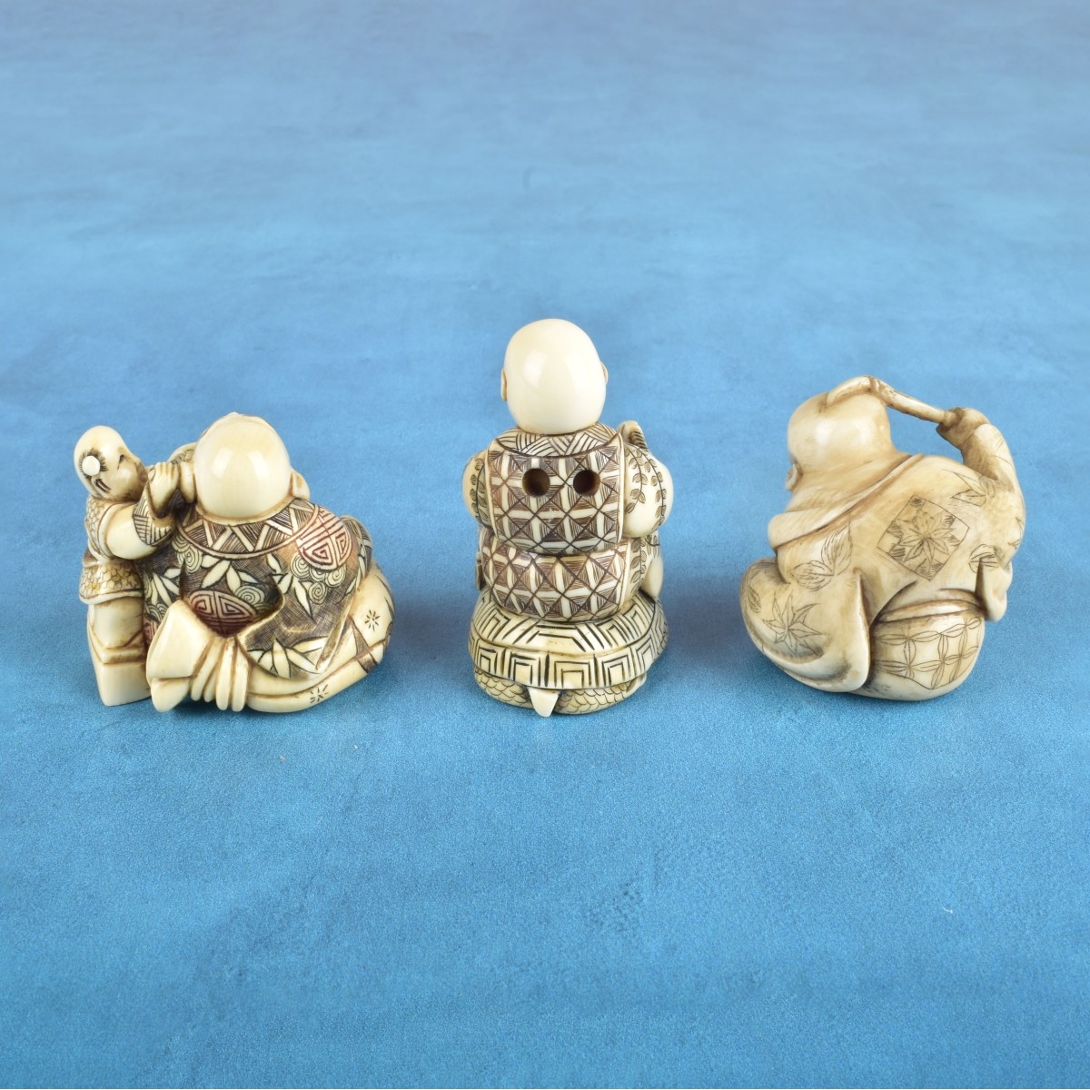 Three Antique Japanese Carved Figurines