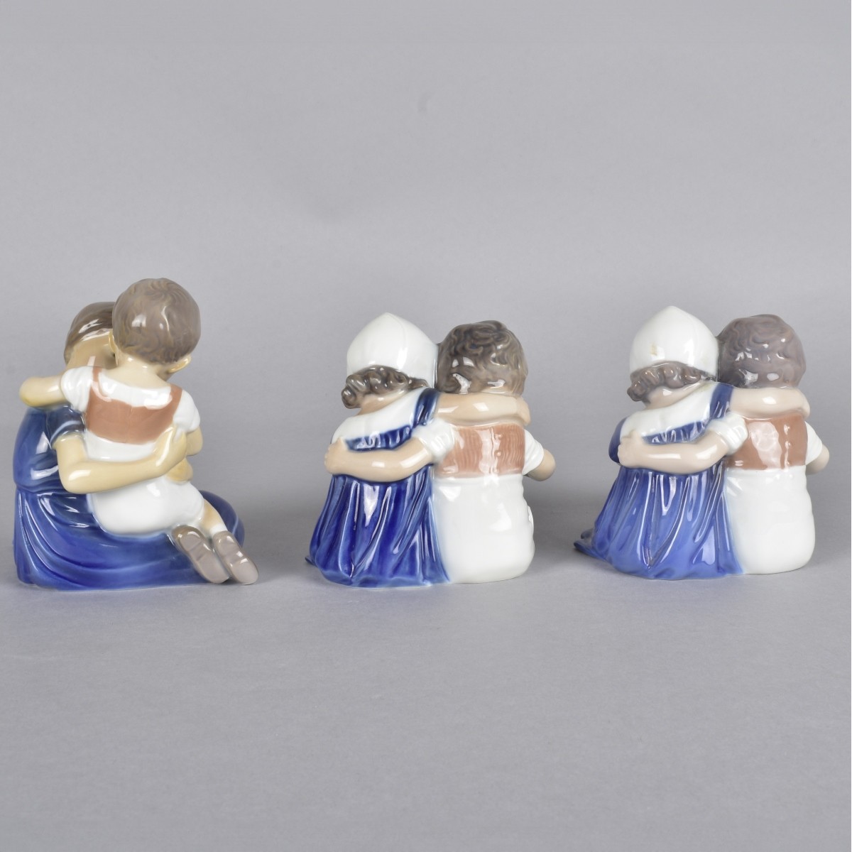 Three Danish Glazed Porcelain Figural Groups