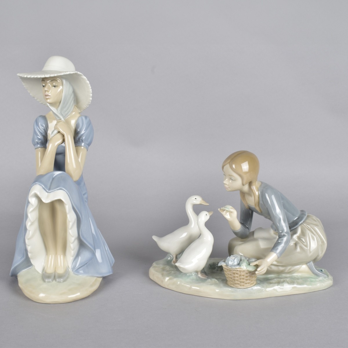 Two Vintage Glazed Porcelain Figurines