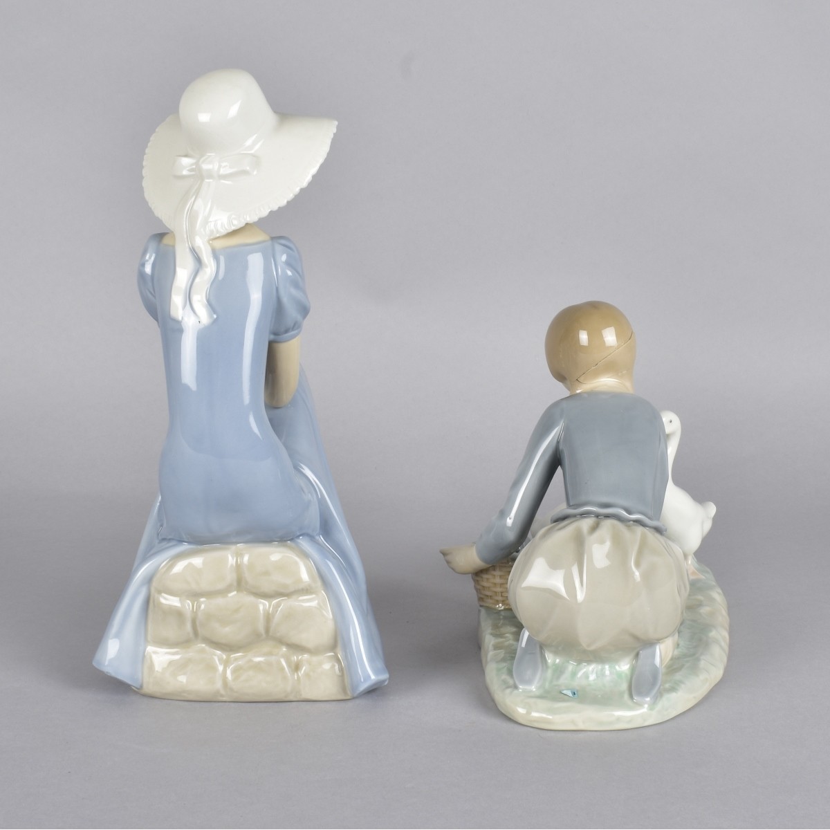 Two Vintage Glazed Porcelain Figurines