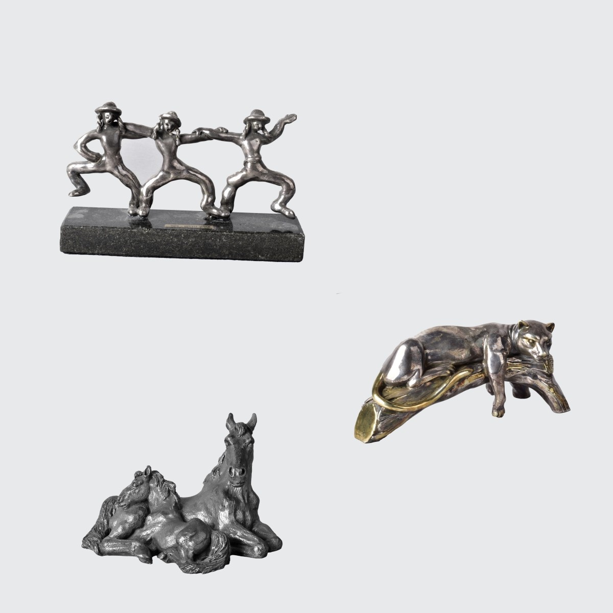 Three Silver-Clad Sculptures