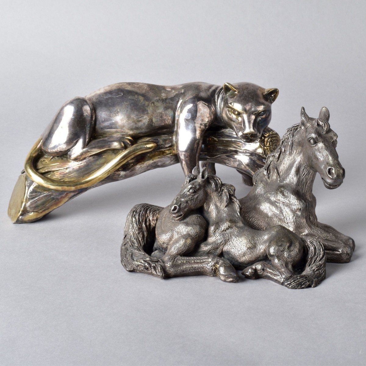 Three Silver-Clad Sculptures