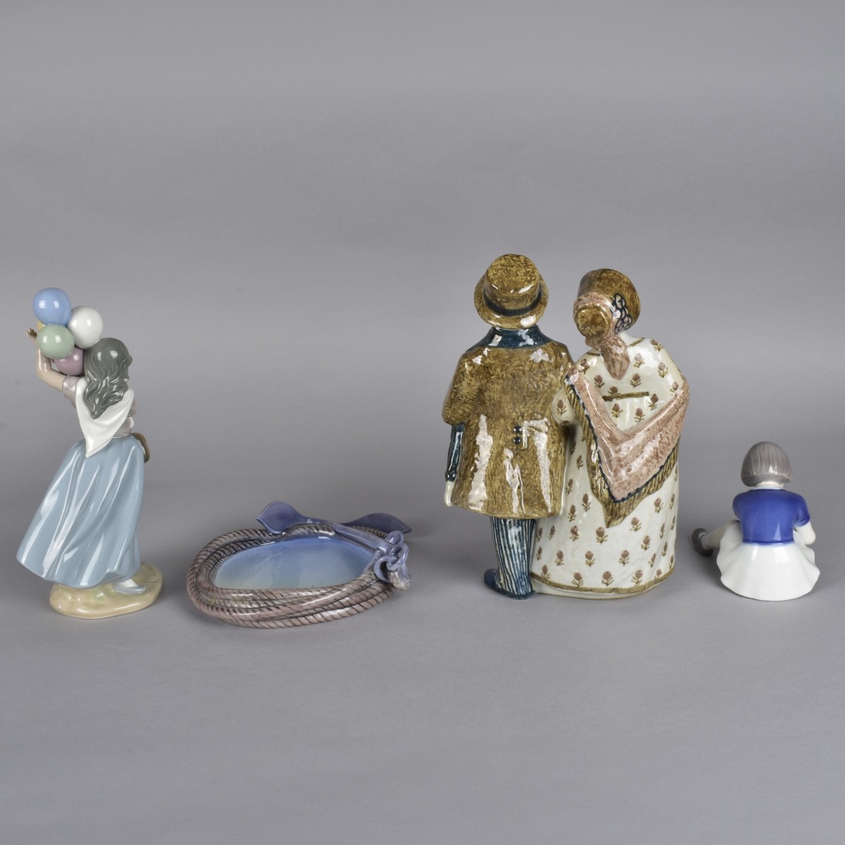 Four Vintage Porcelain Figurines