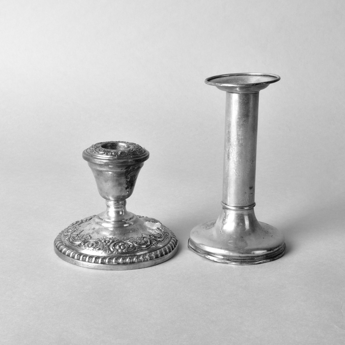 Four Vintage Weighted Sterling Candlesticks