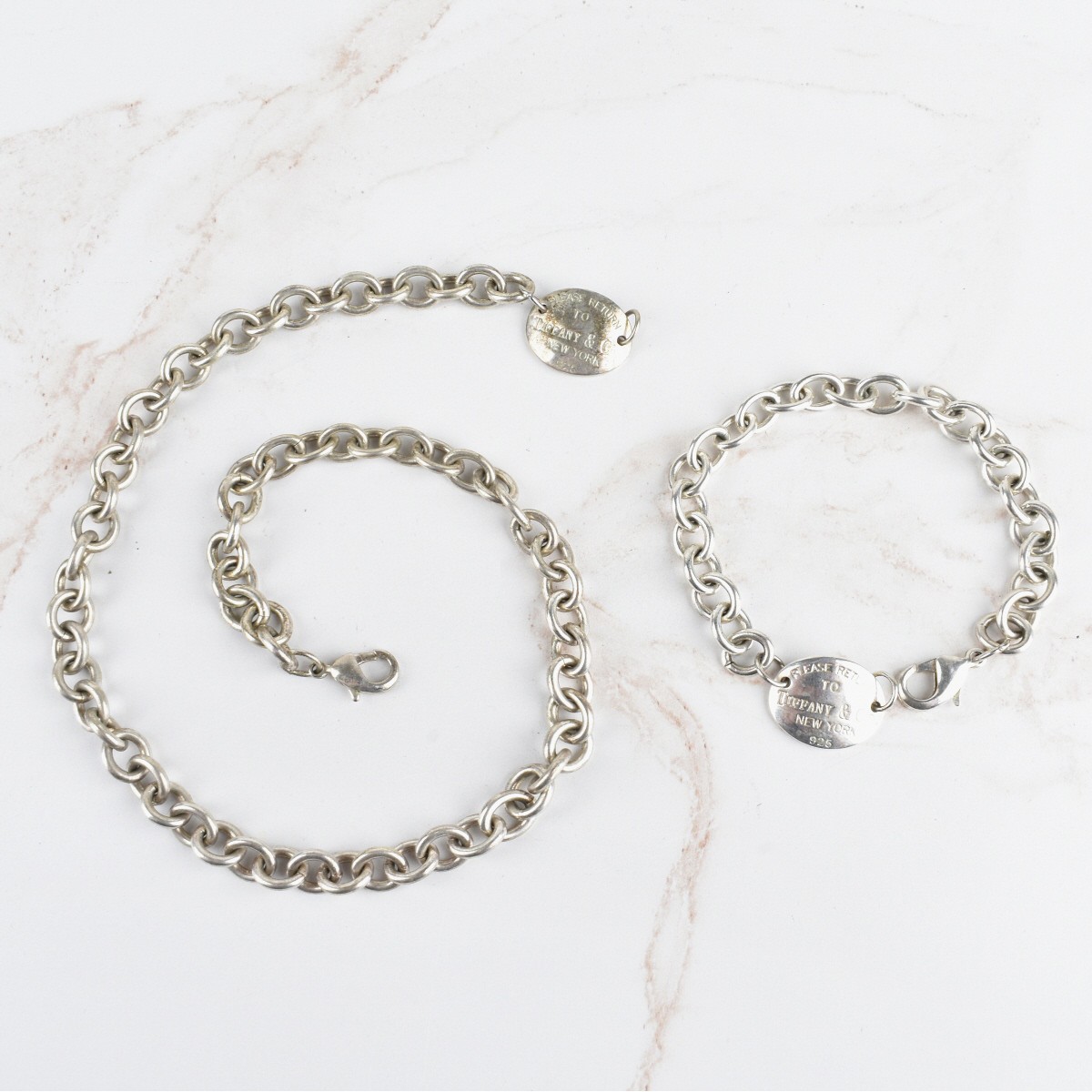 Silver Necklace and Bracelet.