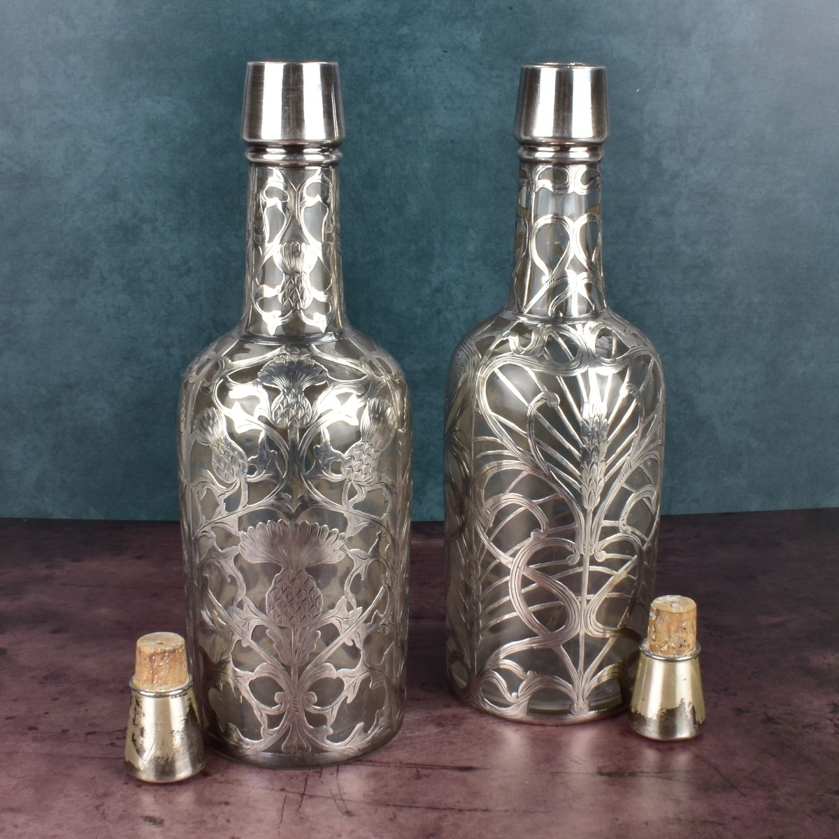 Pair of Black Star and Frost Fine Silver Bottles