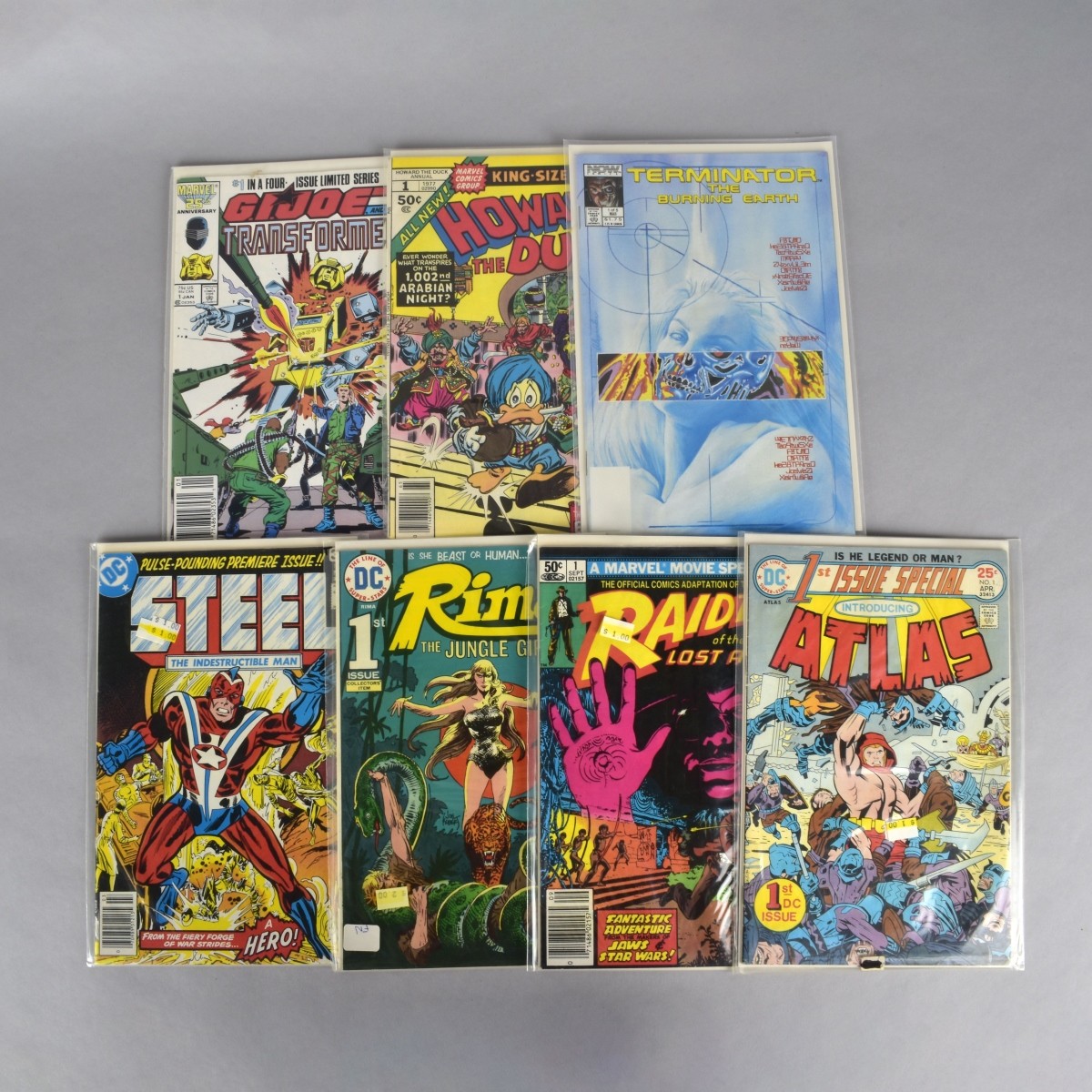 Seven Marvel and DC Comic Books