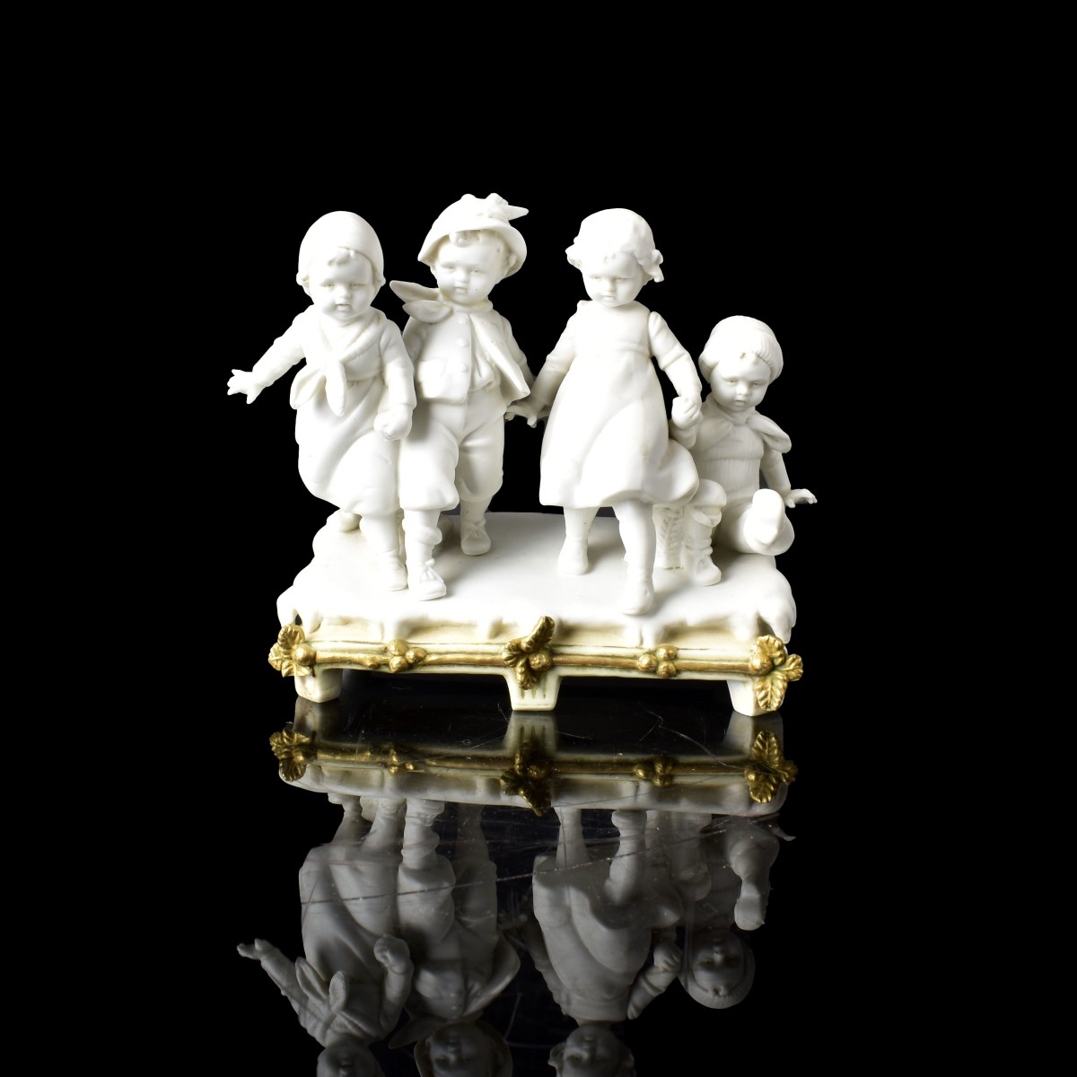 European Bisque "Playing in the Snow" Figurine