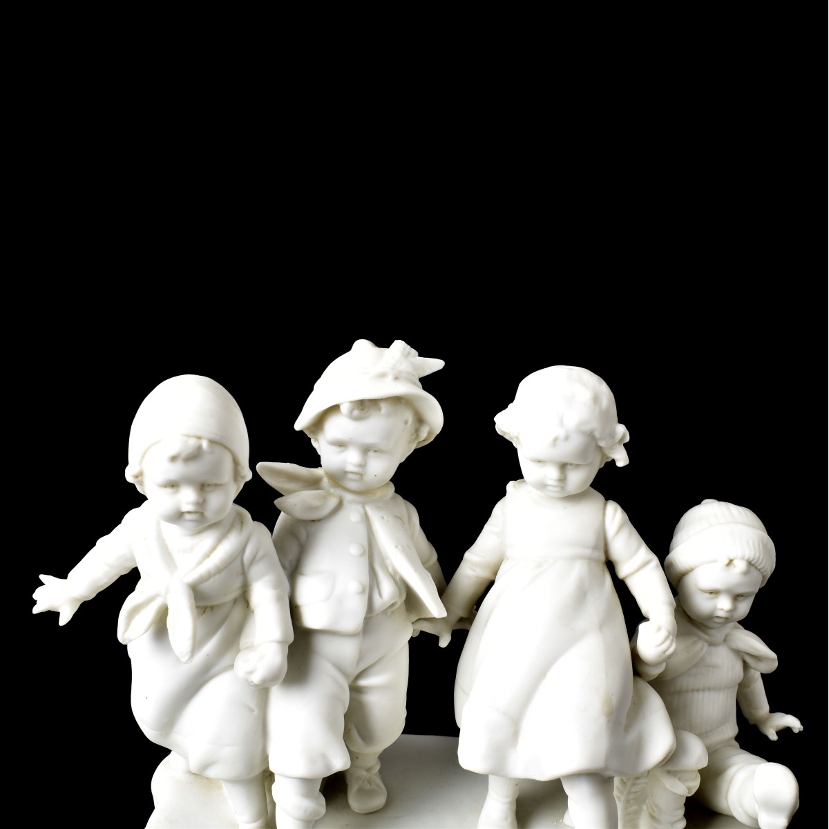 European Bisque "Playing in the Snow" Figurine