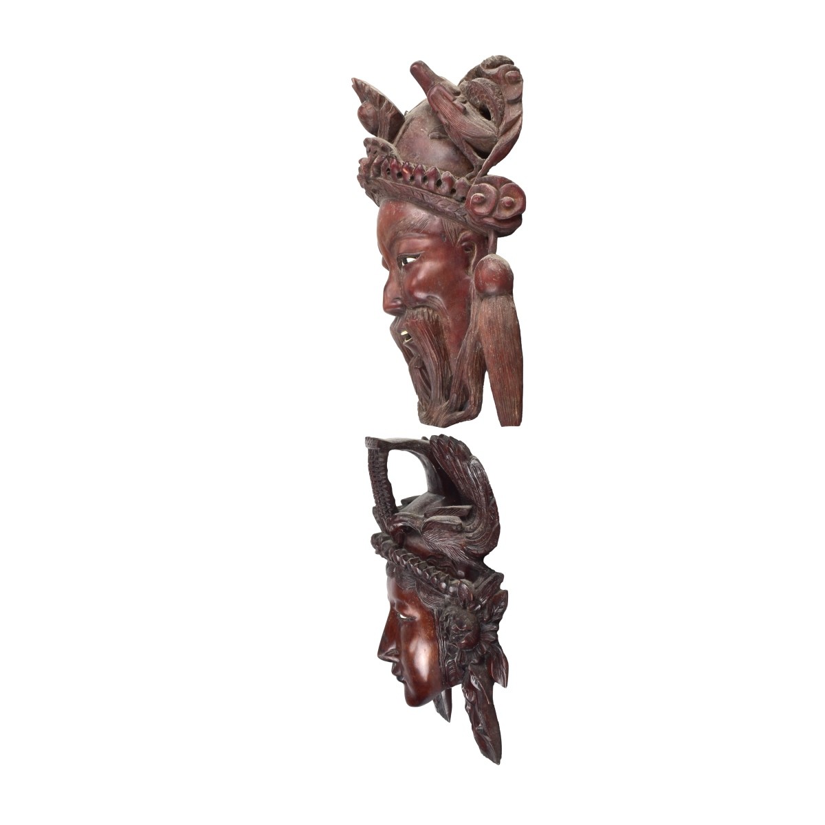 Two Carved Mask Wall Hangings