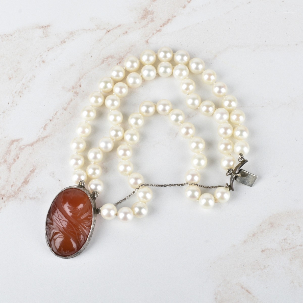Pearl Bracelet and Coral Necklace