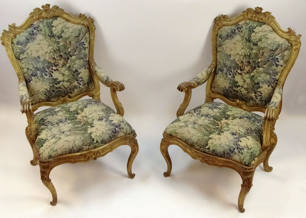 Large pair of 19th Century Italian carved and gilt wood fauteuils