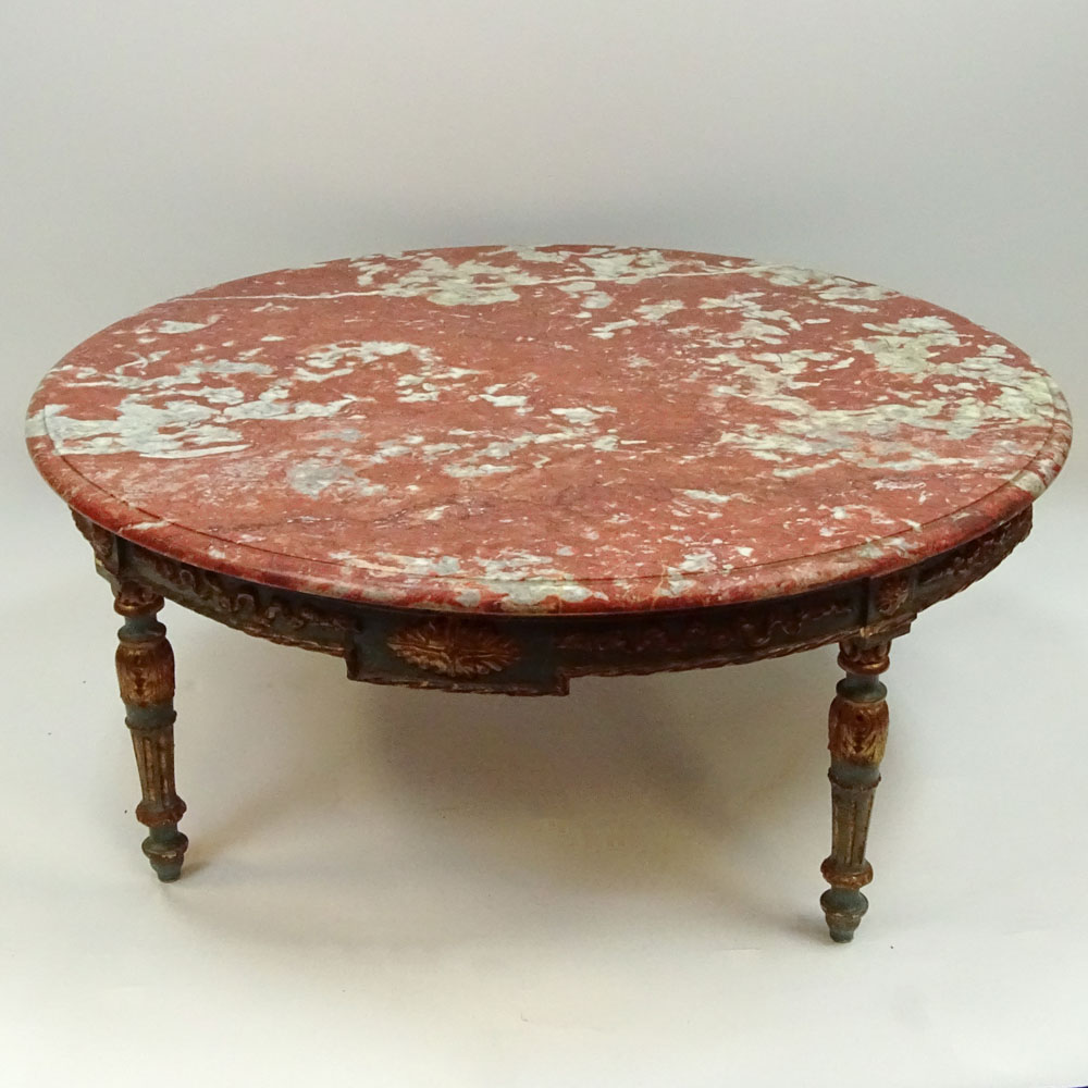 19/20th Century carved painted parcel gilt wood coffee table with marble top.