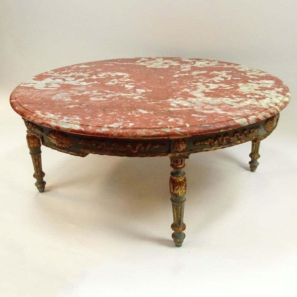 19/20th Century carved painted parcel gilt wood coffee table with marble top.