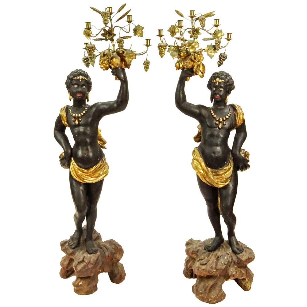 Pair of 19th C Italian Carved Painted and Gilt Wood and gilt tole Blackamoor torchieres.