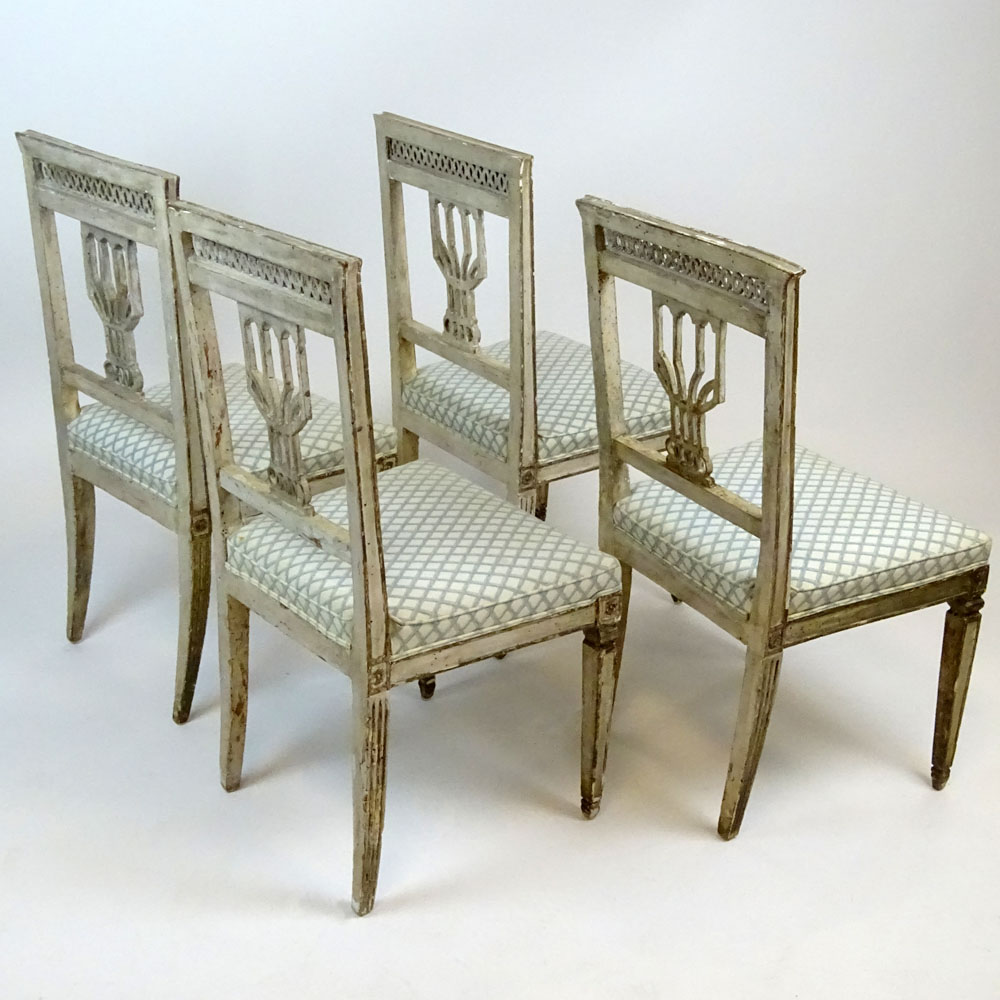 Set of 4 19th Century, probably Italian carved and painted wood side chairs. 