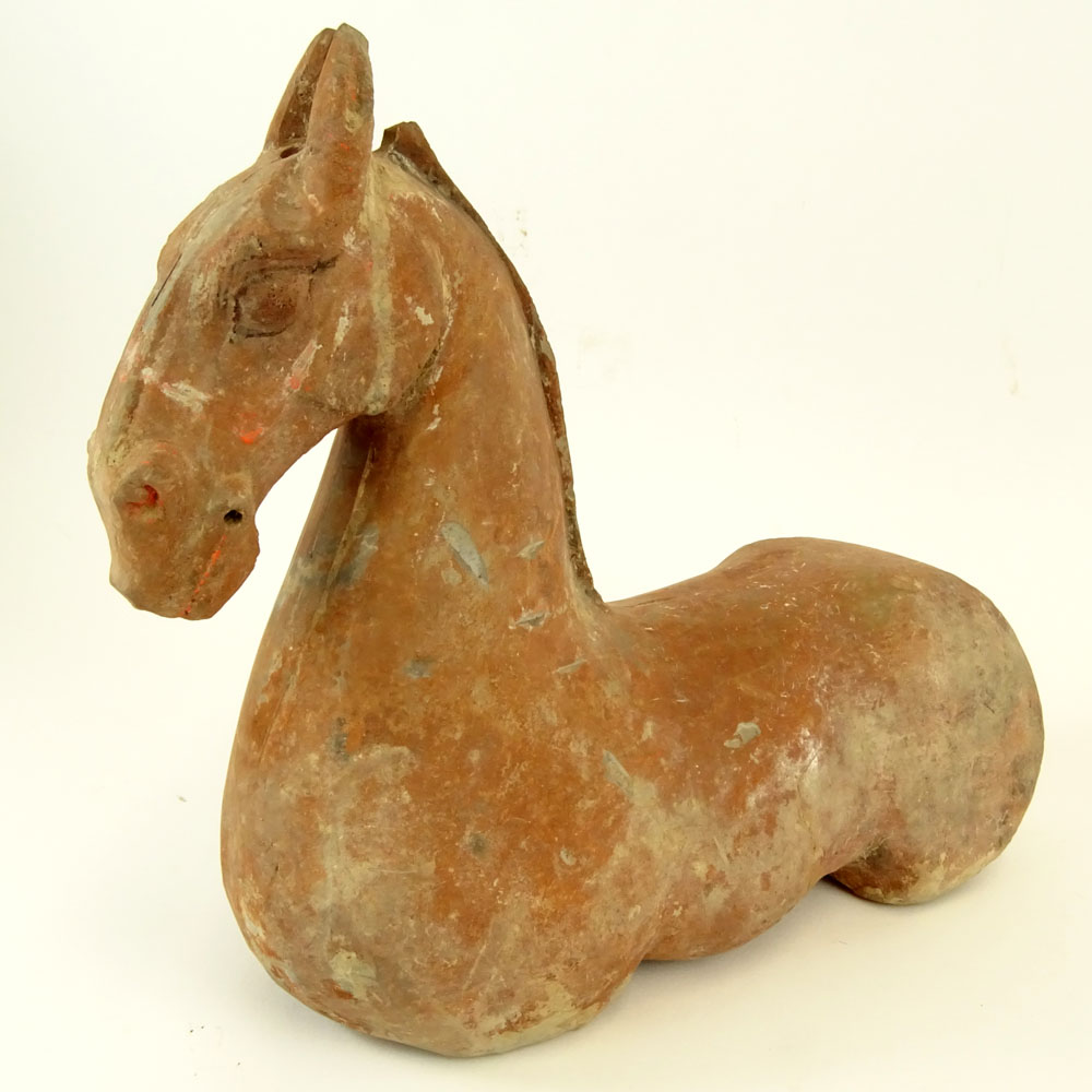 Chinese Han Dynasty Terra Cotta Figure of a Horse with Traces of Pigment.