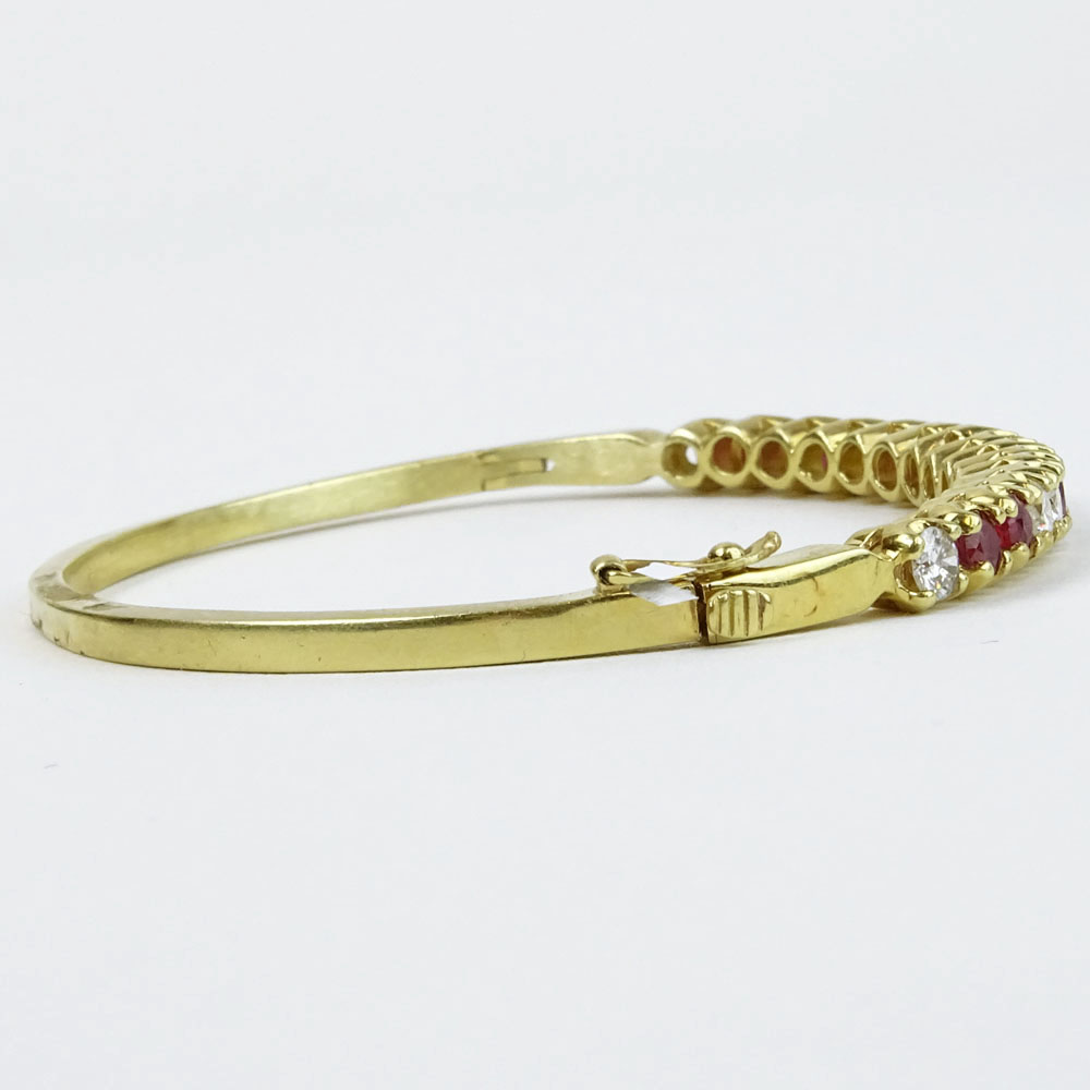 Lady's Vintage Approx. 1.70 Carat Diamond, 1.85 Carat Ruby and 14 Karat Yellow Gold Bangle Bracelet. 